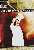 Warming By The Devil`s Fire