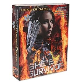 The Hunger Games Movie Puzzle jigsaw puzzle "Shes a Survivor": Toys &amp; Games
