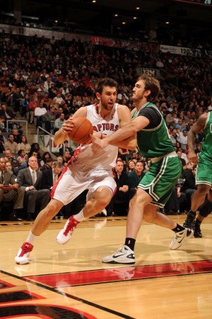 Boston Celtics v Toronto Raptors: Andrea Bargnani and Semih Erden Photographic Poster Print by Ron Turenne, 16x24