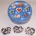 Scott's Cakes 1 lb. Dark Chocolate Covered Pretzel with Chocolate Chips & White Chocolate Chips in a Christmas Cookie Tin