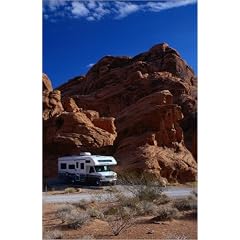 Leinwandbild 60 x 90 cm - "A RV (recreational vehicle) motorhome travels through the Valley of the Moon in Nevada's Red Rocks C" von Emily Riddell / Lonely Planet Images - auch in anderen Gr��en und als Poster erh�ltlich