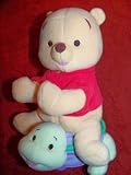 Winnie The Pooh Interactive/Animated Plush: "Rattle And Ride Pooh"