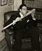 Joe DiMaggio, of the New York Yankees, about to kiss his signature baseball bat - c. 1941 - 16