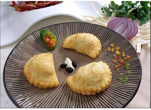 Cuisine Innovations Beef Empanada -- 100 per case.