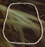Image of 16 inch string of freshwater pearls 3.5-4mm flattened with silver clasp