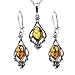 Honey Amber and Sterling Silver Dangling Style title=