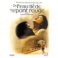 De l'eau ti�de sous un pont rouge