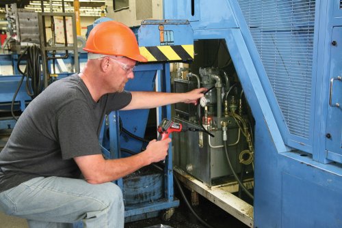 Remote camera from RIDGID in use by man in hardhat