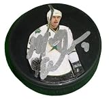 Mike Modano Autographed Dallas Stars Photo Hockey Puck, Proof Photo of Mike Signing for Us.