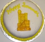 Gourmet Food : Chocolate Decorated Cake Single Layer 8' RoundTopped with Tropical Punch Sand Castle Gummie