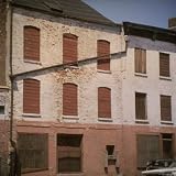Facade of Rundown, Shuttered Warehouses Lit by Late Day Sunlight on Manhattan's Market Slip Photographic Poster Print by Walker Evans, 16x16