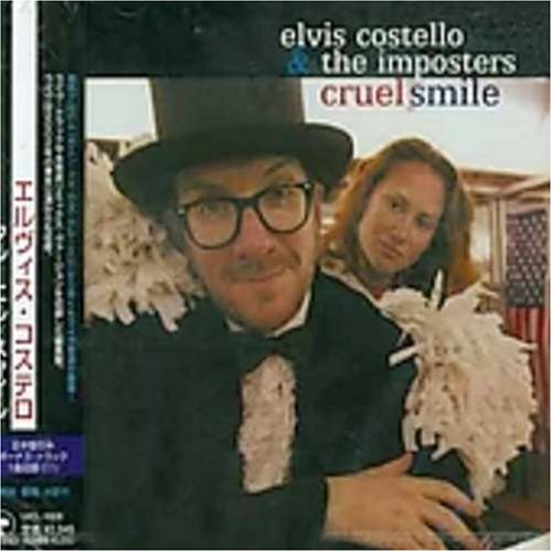 Elvis Costello & the Imposters - 15 Petals Lyrics - Zortam Music