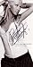 Search : Christina Aguilera autographed half page B&W magazine photo