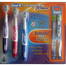 Oral-B CrossAction Battery-Powered Toothbrush, Pack of 3, Plus Two Extra Replacement Brush Heads (Colors may vary) - Medium