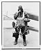 Historic Print (L): A deep air diver--Bert White takes provisions, oxygen, and weapon...