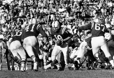 Professionally Framed Johnny Unitas In Action Archival Photo Sports Poster Print - 13x19 with RichAndFramous Black Wood Frame