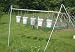 Do-It-Yourself Upside-Down Tomato Containers and Hanging Rack (DIY Done Right)