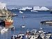 Fishing Boat Returns to Harbour from Disko Bay, with Its Icebergs, Ilulissat (Jacobshavn), Greenland Photographic Poster Print by Tony Waltham, 40x30