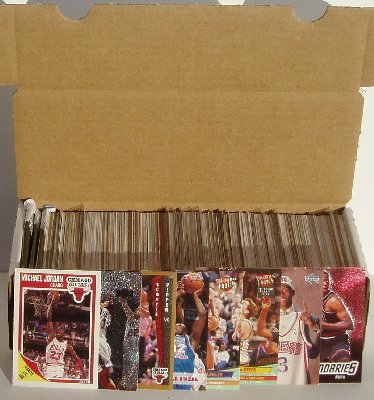 NBA Basketball Card Collector Box Over 500 Different Cards. Great Mix of players from the last 25 years. Ships in a new brand new factory sealed white box perfect for gift giving.