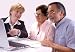 Mature Couple Talking to Financial Planner - 60