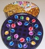 Scott's Cakes Taffy, Peanut and Pretzel Brittle, and Peanut Butter Pretzel Nuggets Combo in a Christmas Lights Tin