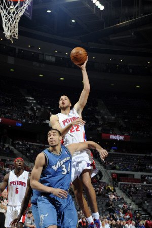 Washington Wizards v Detroit Pistons: Tayshaun Prince and JaVale McGee Photographic Poster Print by Allen Einstein, 24x36