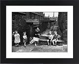 Framed Prints of Children playing in a back alley - Salford, Manchester 1962 from Mary Evans