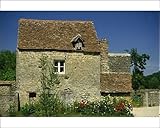 IMAGE OF Photographic Prints of Close-up of exterior of a stone house, with cracked walls, and a flower bed, from Robert Harding