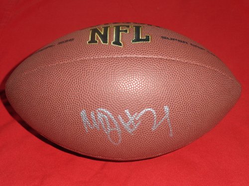 Marshawn Lynch Autographed NFL Wilson Composite Football, Seattle Seahawks, California Golden Bears, Proof Photo of Marshawn Signing for Us.