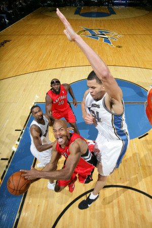 Toronto Raptors v Washington Wizards: Jarrett Jack and JaVale McGee Photographic Poster Print by Ned Dishman, 24x36