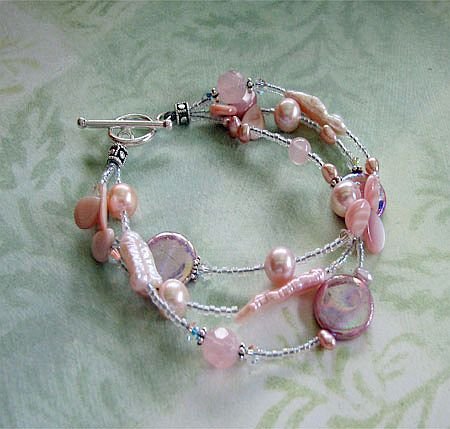 Click here to buy 3 Strand Pink Freshwater Pearl and Swarovski Crystal Bracelet.