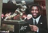 Ricky Williams - with Heisman Trophy - 16x20 Autographed Photograph