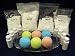 Complete Bath Bomb Starter Kit, 2 lbs. Baking Soda, 1 Lb. Citric, 1 lb. Corn Starch, 1 lb. Epsom Salt, 4 x 1 oz. fragrances, 4 x 1 oz. FD&C = Strawberry Red, Lemon Yellow, Sky Blue, Mint Green. Molds not included.