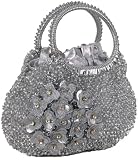 Feel special with this gorgeous ornate hand-beaded evening bag with petal detail and internal silver pouch. From Niche Collections