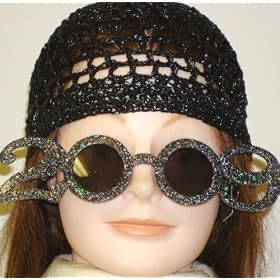 Click here to buy Hand Crocheted Black Metallic Gimp Skull Cap Offered in Combination with Black Frame 2009... by Gita.
