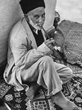 Old Muslim Enjoying Last Smoke Before Entering the Mosque For Friday Afternoon Service Photographic Poster Print by Stan Wayman, 18x24