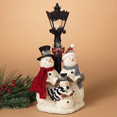 Gerson 16.9 in. Battery-Operated Lighted Snowman Carolers Figurine and Lamp Post
