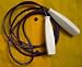 Purple cord with white handles. For jumpers 4' 8" to 5' 2". Sturdy, adjustable, fast. Made in US by mentally and physically challenged workers.