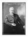Newswire Photo (L): Dr. W.O. Stillman, President of the American Humane Association, seated