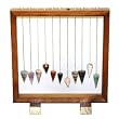 Set of 11 Pendulums in a Wood Frame Display - Pink Tourmaline, Zebra Stone, Rose Quartz, Tigers Eye, Black Jasper, Amethyst, Red Jasper, Natural Agate, Emerald, Crystal Quartz, Green Aventurine