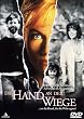 Die Hand an der Wiege