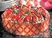 Classic Fruitcake Round in Forest Green Tin w/ Gold Labeling Image