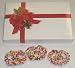 Scott's Cakes 1/2 lb. Milk Chocolate Covered Pretzel with Rainbow Jimmies in a Ribbon n Holly Box
