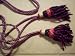 Cloth Bagpipe Drone Cord: Dark Green, Red, and White.
