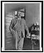 Historic Print (M): [John Ford, three-quarter length portrait, standing, facing sligh...