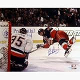 Eric Lindros Autographed Diving Shot vs Islanders 8 x 10 Photograph (Unframed)