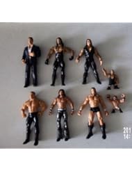Single Detail Page Misc: WWE Wrestling Lot Action Figures William Regal, the Undertaker, Titan Tron and more By Jakks Pacific