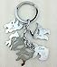 One Set of 2 PCS Pokemon Metal Keychain Sylveon Vaporeon Flareon Eevee Umbreon Espeon Jolteon