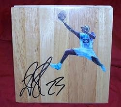 Devin Brown Autographed New Orleans Hornets Photo Floorboard, Photo Proof of Devin Brown Signing This Exact Floorboard for Us.