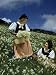 Women Pick Narcissus Flowers Blooming on a Hill Near Lake Geneva Photographic Poster Print by Willard Culver, 18x24